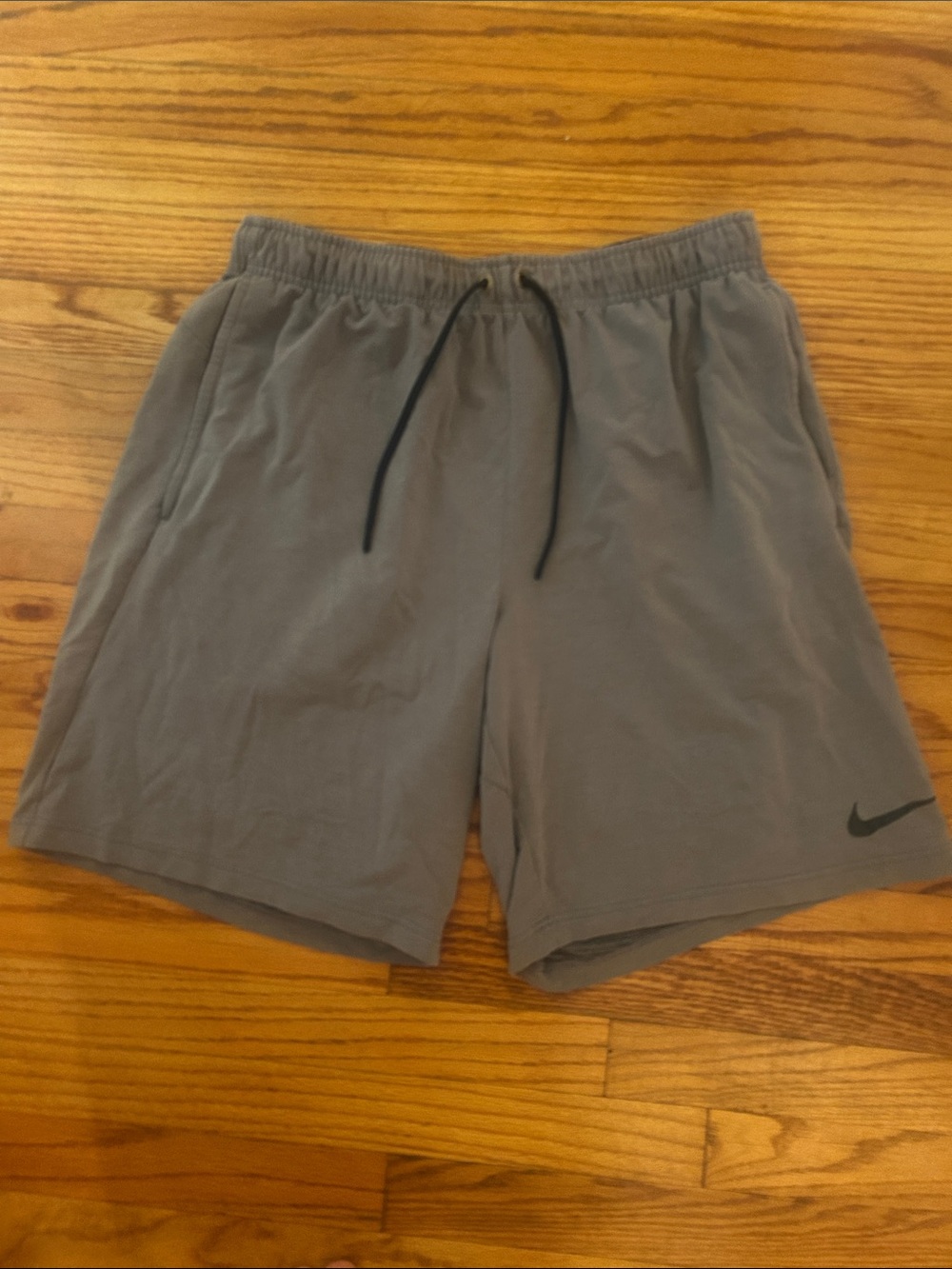 Nike Men's Gray Performance Athletic Shorts with Black Swoosh